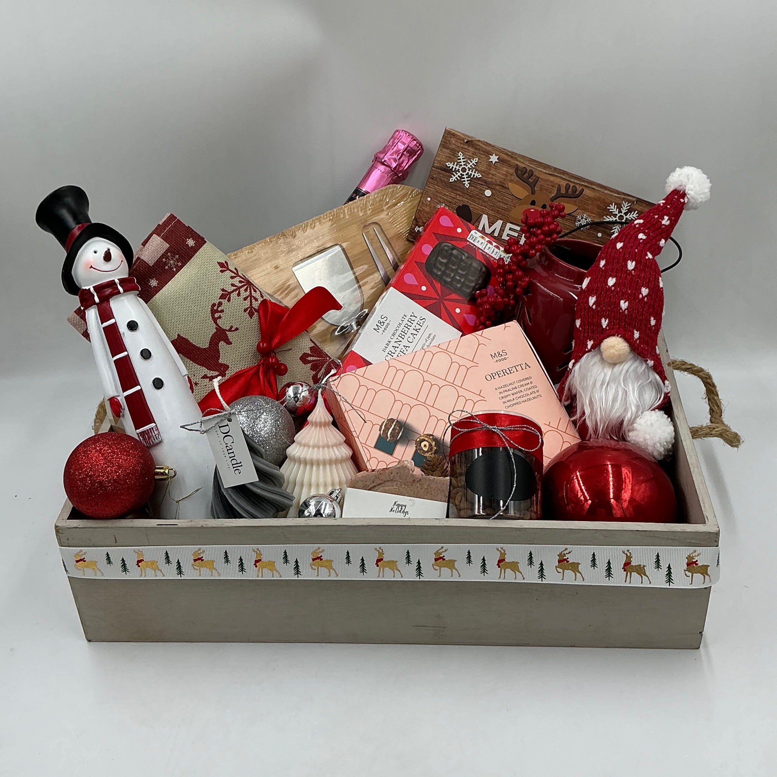 Gourmet hamper, with chocolates, festive candles, natural soap, cheese board, table runner, candle porcelain decorative bowl, coffee beans