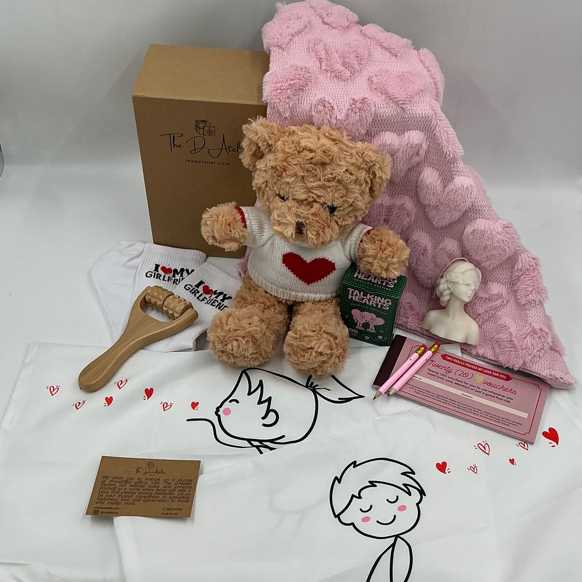 Teddy bear with heart sweater, pink furry pillow case, vouchers love care attention, talking hears cards
, pink pencils, 2 pillow cases girl and boy white, I love my girlfriend socks, body massage roller, candle woman shape