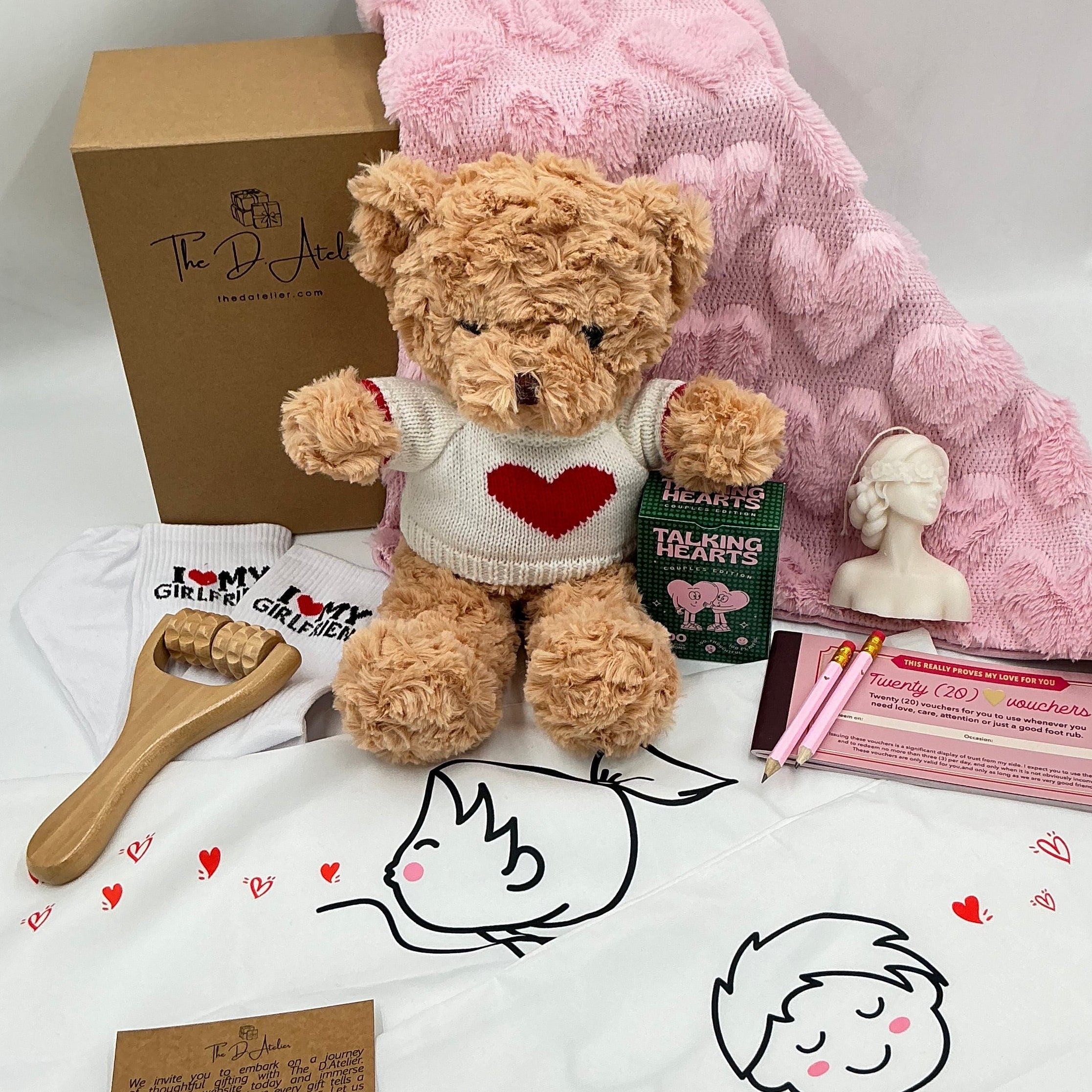 Teddy bear with heart sweater, pink furry pillow case, vouchers love care attention, talking hears cards
, pink pencils, 2 pillow cases girl and boy white, I love my girlfriend socks, body massage roller, candle woman shape