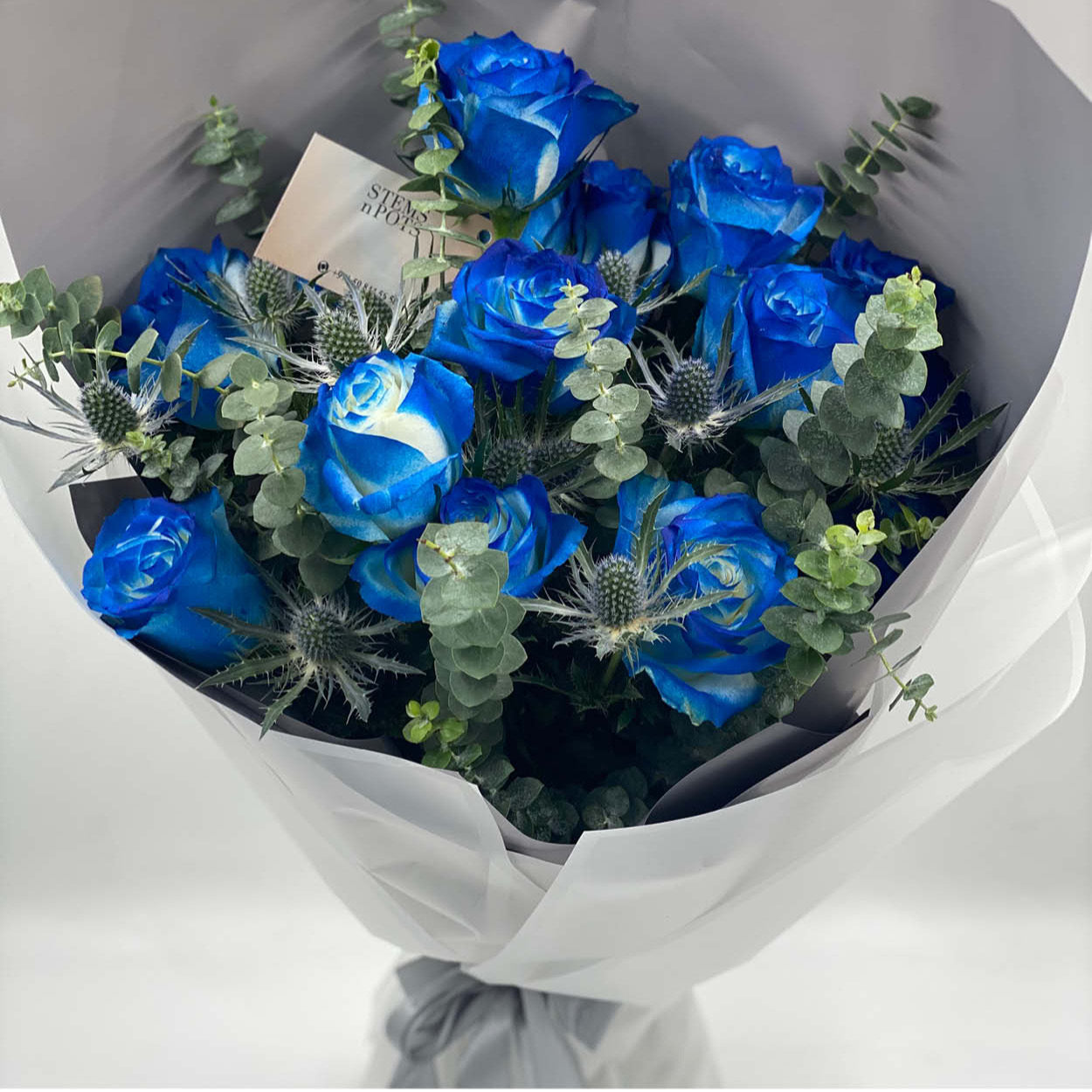 Blue Roses & Eucalyptus Bouquet – A Unique Birthday Gift for Him