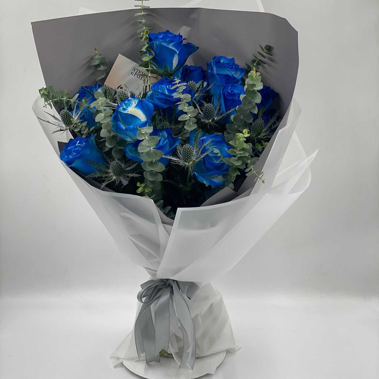 Blue Roses & Eucalyptus Bouquet – A Unique Birthday Gift for Him