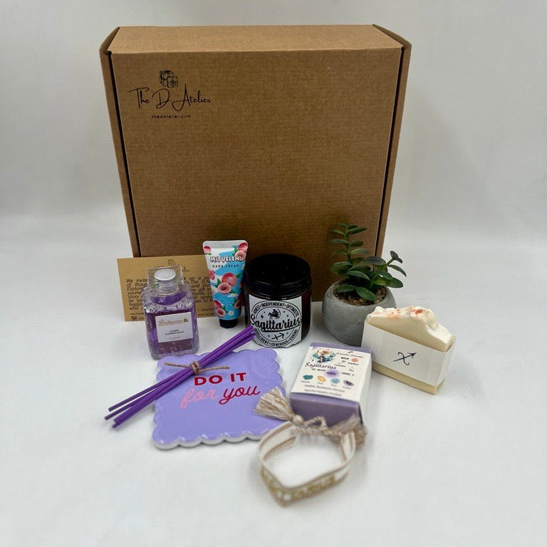 Collection of small items ideal for the Sagittarius horoscope including a plant, natural handmade soap, lavender Soap, infuser 
