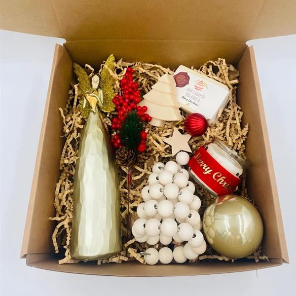 Box for Christmas that includes An angel, natural handmade soaps, ornaments, and candle 