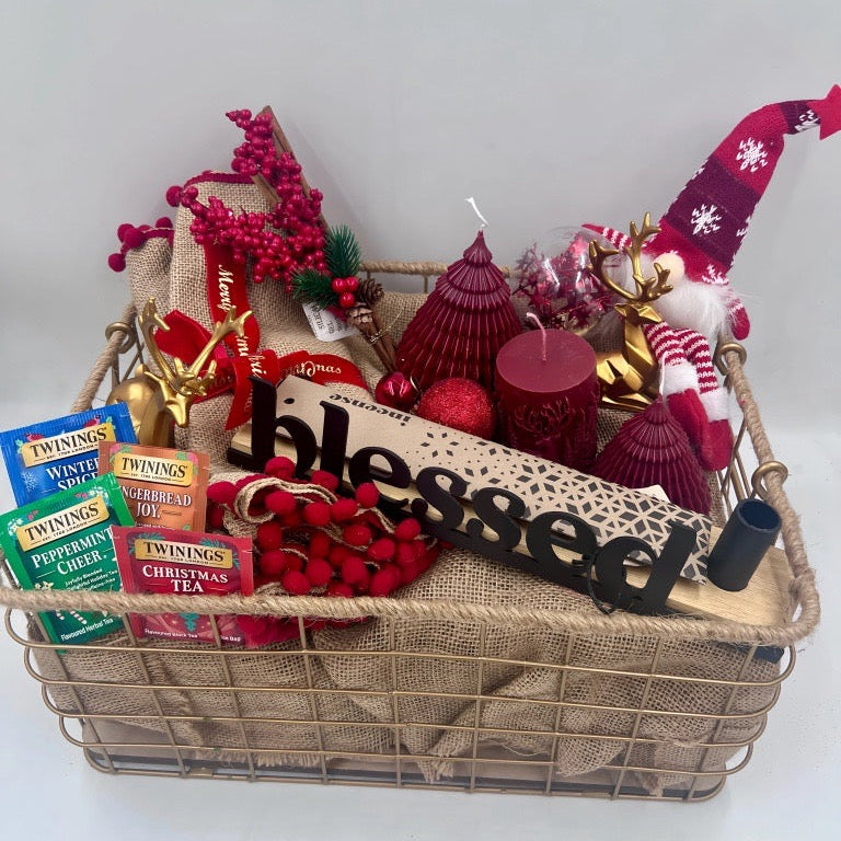 A Metal Hamper including metal incense burner, Christmas red candles, Christmas ornament, table festive runner, 4 tea sachet; gold reindeers